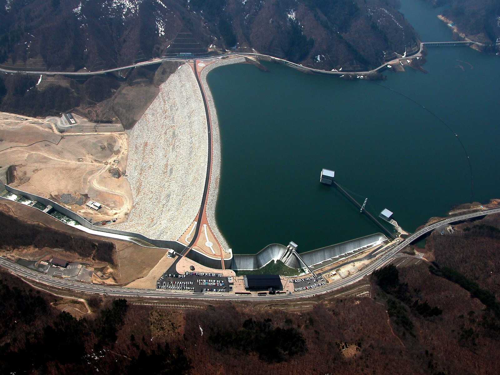 Completion of a large-scale rock-filled dam